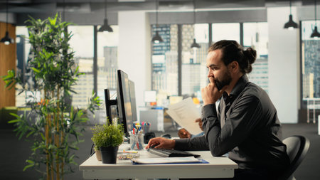 Group of coworkers engaged in consulting and report sharing at office. Professional team reviews...