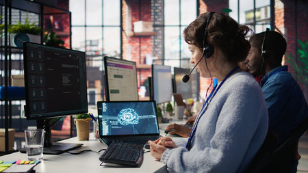 Worker providing live chat support, typing on keyboard, using AI chatbot to handle clients...