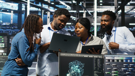 Portrait of smiling data center specialists collaborating in server facility, using node tree...