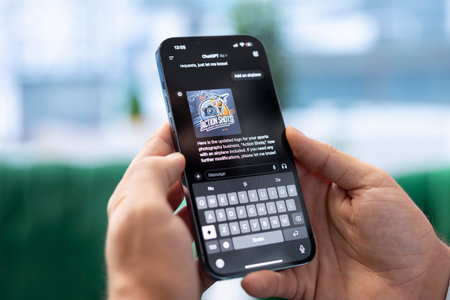 Bucharest, Romania - July 30th 2024 - Leader typing prompts into AI chatGPT on mobile app, using the advanced virtual assistant to find smart solutions for business operations.のeditorial素材