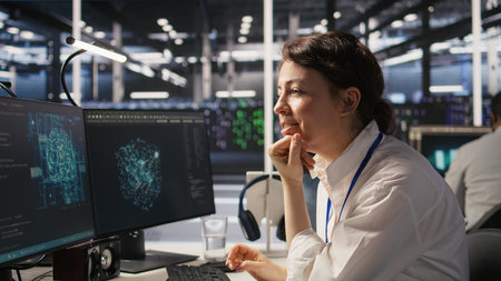Excited data center engineer dancing in office chair after achieving breakthrough results on AI...