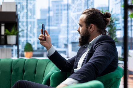 Entrepreneur discussing with shareholders about increasing profit strategy, meeting on online video call to plan the next steps in achieving the objectives. Corporate culture.の写真素材