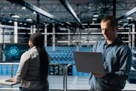 Server farm team of technicians using devices to do infrastructure automatization, running AI...