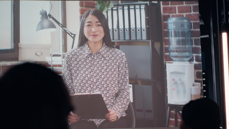 Enterprise team joining advisory board discussion after hours with CEO, connecting with the boss to establish finance targets and align project strategy through live web conversation. Camera B.の写真素材