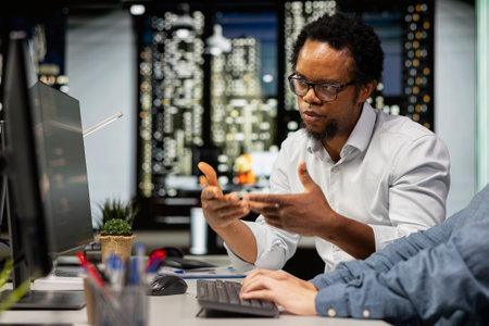 Technicians chatting in startup office, coding advanced machine learning models enhancing...