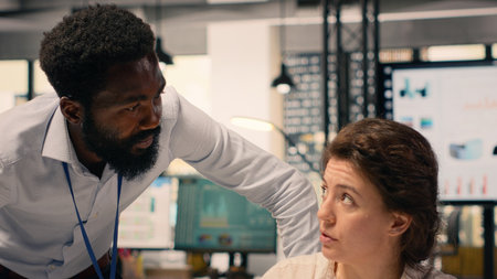 Diverse business team, collaborating on reporting, data analysis, professional office workspace. Charts and insights, performance evaluation, project development, team collaboration.の写真素材