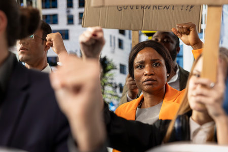 African american activist protesting together with diverse people during strike and public march...