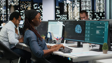 Female programmer using large language model application to get help with coding tasks. African...