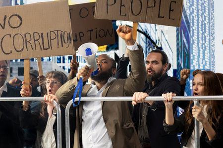 Large crowd of diverse protesters using megaphone and fighting against corruption government, having...