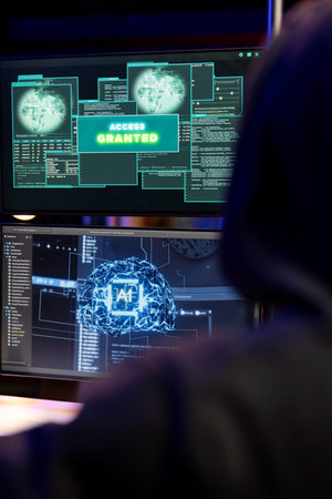 Cybercriminal coding on PC getting access granted message, evading security with stealth malware....