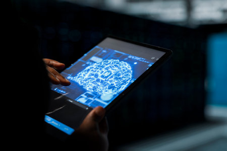 Close up of data center admin using AI assistant to install equipment used for hosting digital...