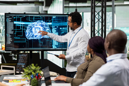 Startup coworkers discussing artificial intelligence tech roadmap during briefing session....