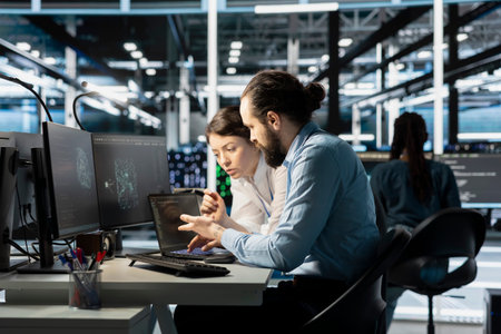 Team of software developers in data center integrating AI driven automation tools. Server farm IT...