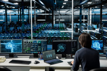 IT expert using PC in high tech server hub with gear supporting deep learning scientific...