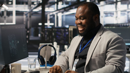 Cheerful data center worker dancing from joy after finishing supercomputers system maintenance....