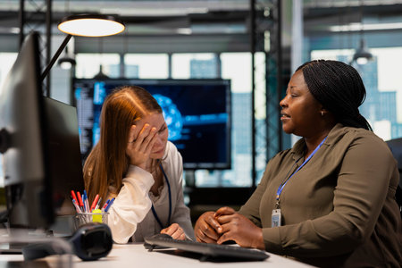 AI tech startup engineer confiding personal struggles to her friend at work during office break....
