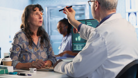 Medical professional examines patient reaction to light for concussion assessment, checking for...