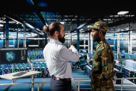 Army officer and engineer fighting against cyber threats in data center, defending government...
