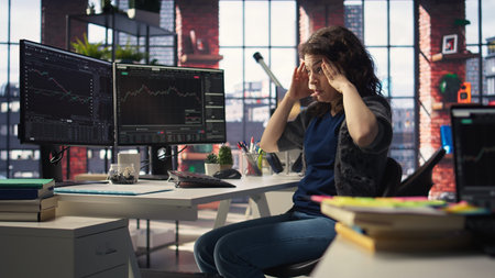 Business professional being devastated with monetary losses and bankruptcy, watching stock exchange...