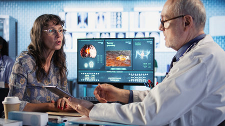 General practitioner consults old female patient about diagnostic test results, utilizing medical...