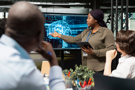 Startup female entrepreneur showing investors how to leverage artificial intelligence tech. African...