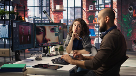 Photographers team collaborating on AI generated material using text to image tools. Editing...
