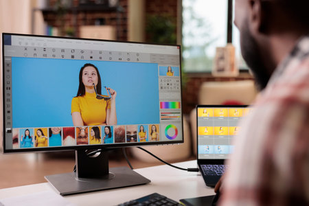 African american editor using retouching software to edit photo, creating professional photography...