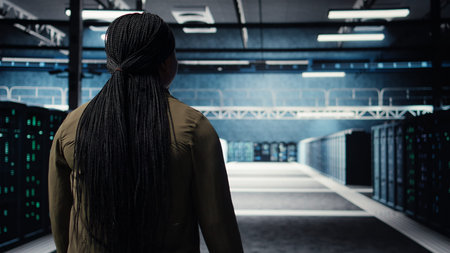 Data center manager conducts security audits to protect against cyber threats and errors. Employee...