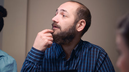 Man talking in business meeting close view, slow motion, employee discussing company strategy,...