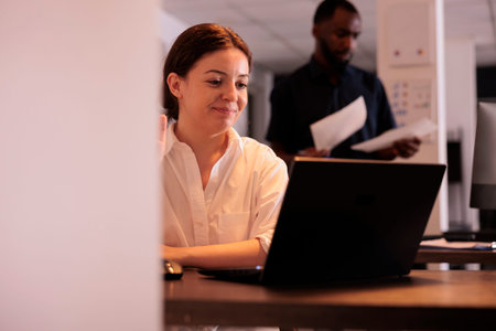 Smiling project manager greeting colleague on online meeting, teleworking, discussing startup plan,...