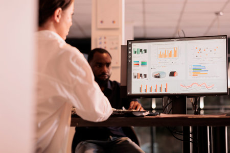 Employee analyzing company financial report dashboard on computer screen, woman working on business...