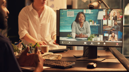 Employee using videocall teleconference online on computer, attending remote internet meeting with...