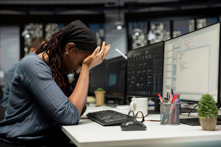 Tired admin in AI startup office having strained eyesight from overworking, taking break to recover....