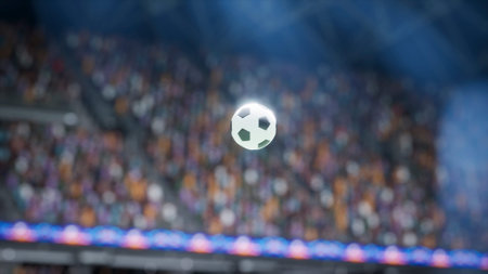 3D illustration of soccer ball moving across pitch inside stadium at night, lit by spotlights. Close up of computer graphics rendered football ball crossing dark live sports arena playground field