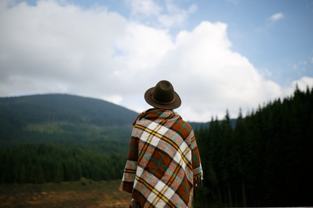 A man admisring a Carpathians landscape. Transalpina, Romania Horizontal outside shot.の写真素材