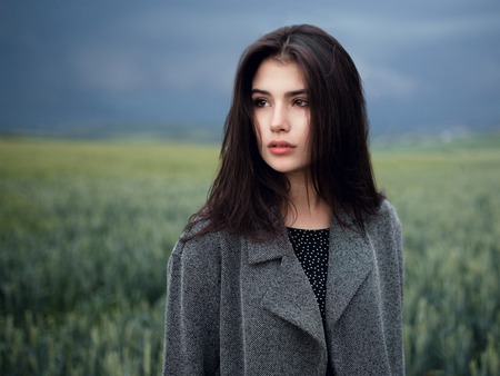 Portrait beautiful youth brunette model with green eyes, perfect skincare, dressed casual, posing...