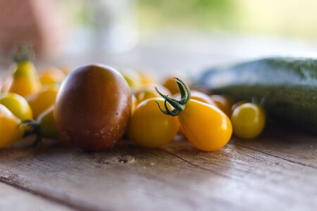 Zucchini and tomatoe harvest from the gardenの写真素材