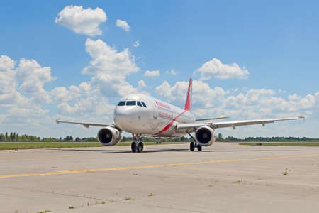 Boryspil (UKBB/KBP) Airport, Ukraine - July 5, 2014. Air Arabia Airbus A320 (A6-ANA) taxiing to the gate after landing. のeditorial素材