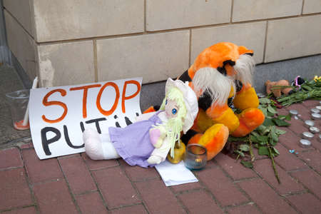 Kiev, Ukraine - July 18, 2014. People brought flower and toys to the embassy of the Netherlands...