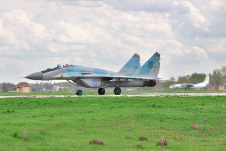 Vasilkov, Ukraine - April 24, 2012. Ukrainian Air Forces MiG-29 fighters during the training flightsのeditorial素材