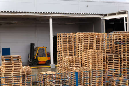 Warehouse yard with the forklift on the rampの写真素材
