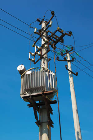 Pylons with electric wires and distribution transformer