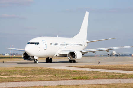 Passenger jets on the runway in the airportの写真素材