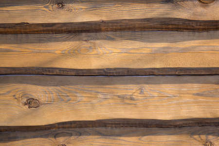 Wooden board with old planks texture in sunset lightingの写真素材