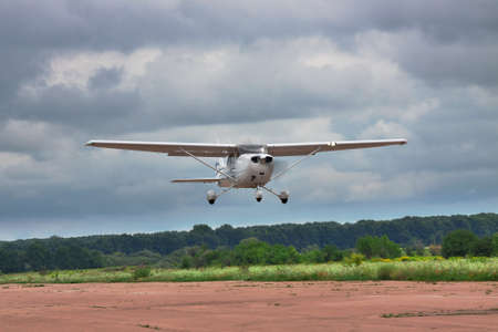 Private plane is taking off into the stormy skyのeditorial素材