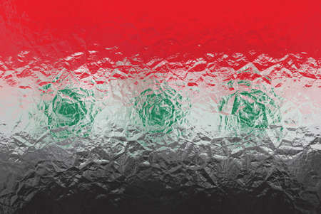 Iraqi flag - triangular polygonal pattern of crumpled shiny metal surfaceの写真素材