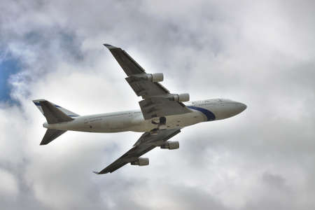 Borispol, Ukraine - October 2, 2011: El Al Israeli Airlines B747 flying into stormy skyのeditorial素材