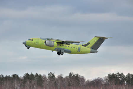 Gostomel, Ukraine - January 31, 2011: Brand New Antonov An-148 regional jet is taking off for a test flightのeditorial素材