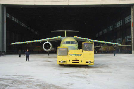 Kiev, Ukraine - December 30, 2012: Antonov An-148 regional passenger jet is towed out of assembly hangar for the first timeのeditorial素材