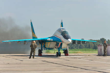 Vasilkov, Ukraine - August 3, 2012: Ukrainian Air Force MiG-29 being prepared for a training flightのeditorial素材
